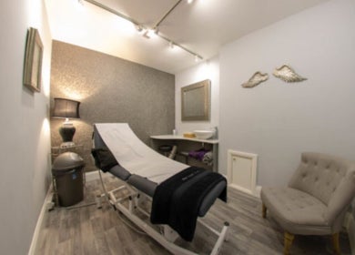 Elegant treatment room at Hannah McCoy Clinic Leeds, featuring a comfortable chair and modern decor, in Leeds, England, GB.
