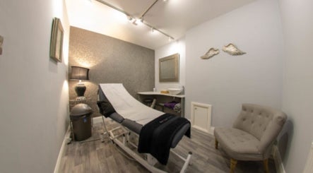 Elegant treatment room at Hannah McCoy Clinic Leeds, featuring a comfortable chair and modern decor, in Leeds, England, GB.