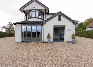 Modern entrance of Hannah McCoy Clinic Leeds, located in a serene setting in Leeds, England, GB.