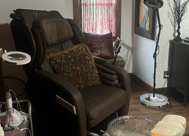 Relaxing massage chair at Mayra Elaine Beauty, Merrillville, Indiana, US for a peaceful wellness experience.