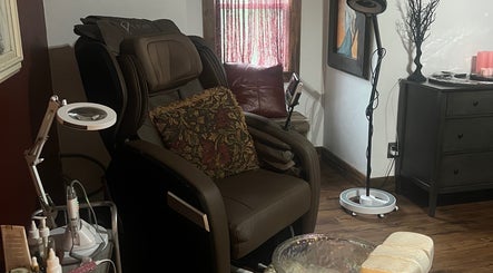 Relaxing massage chair at Mayra Elaine Beauty, Merrillville, Indiana, US for a peaceful wellness experience.