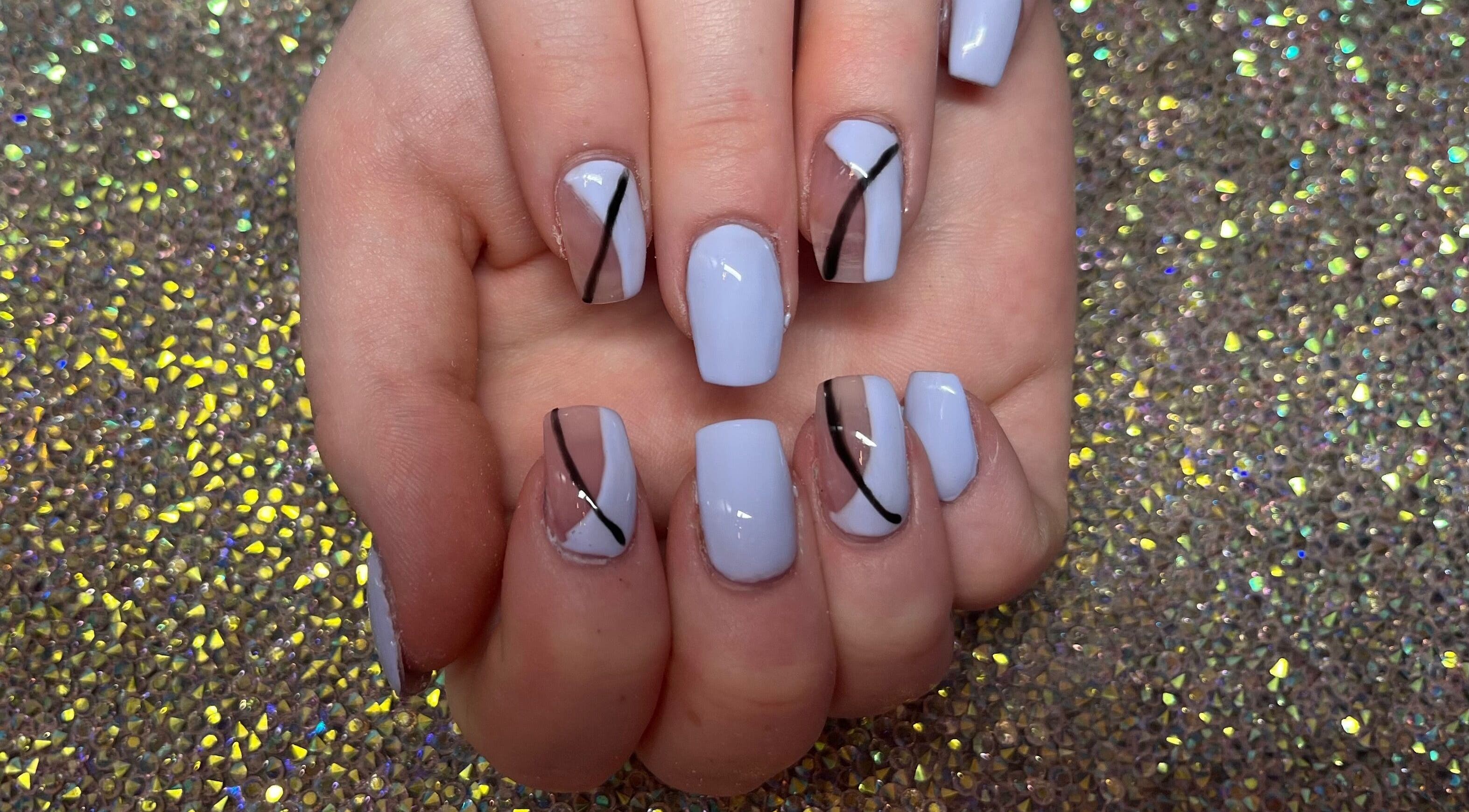 Stylish manicure at Twinkle Toes and Fingers & Aesthetics in Taverham, England, GB showcasing sleek nail art.