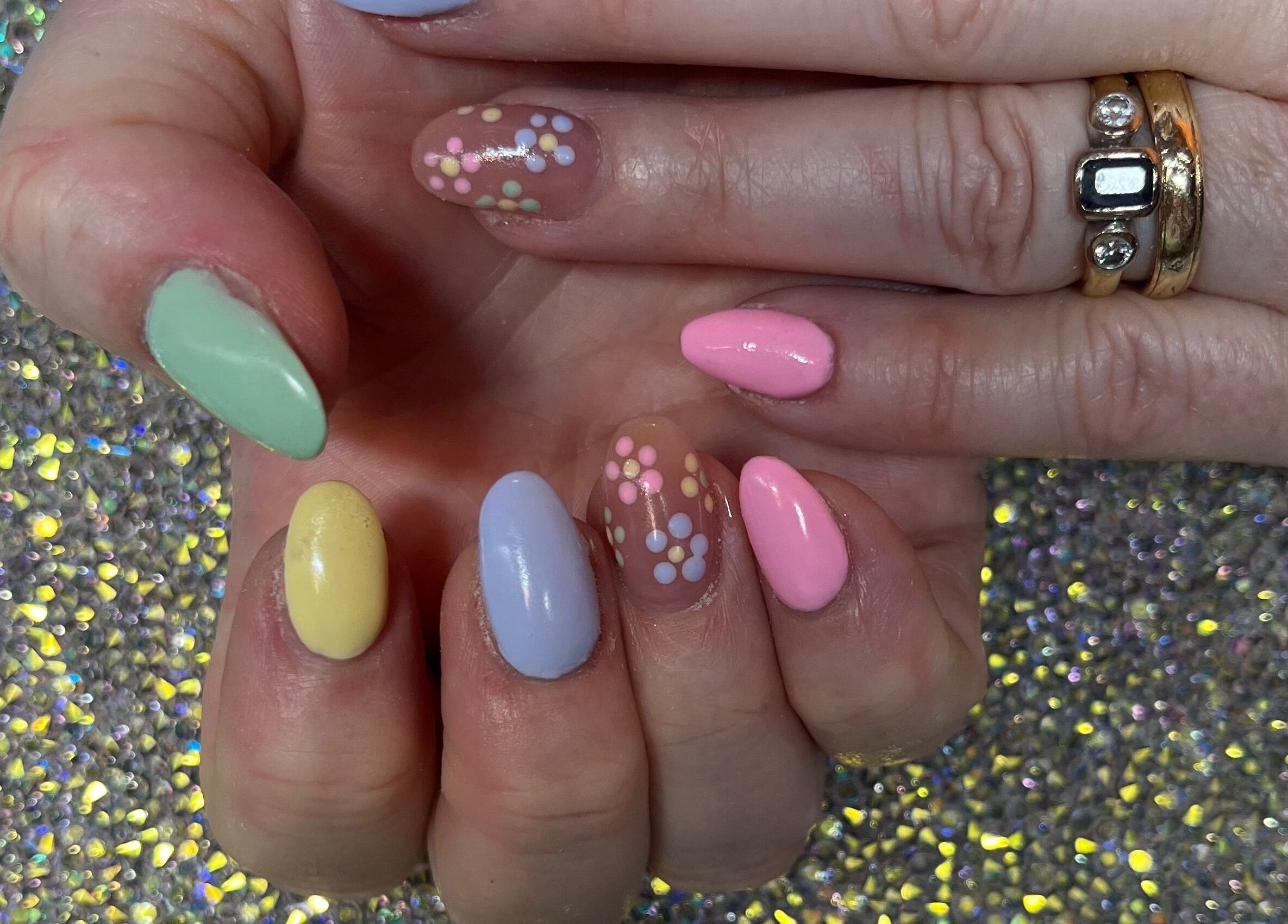 Colorful nail art showcase at Twinkle Toes and Fingers & Aesthetics, Taverham, England, GB.