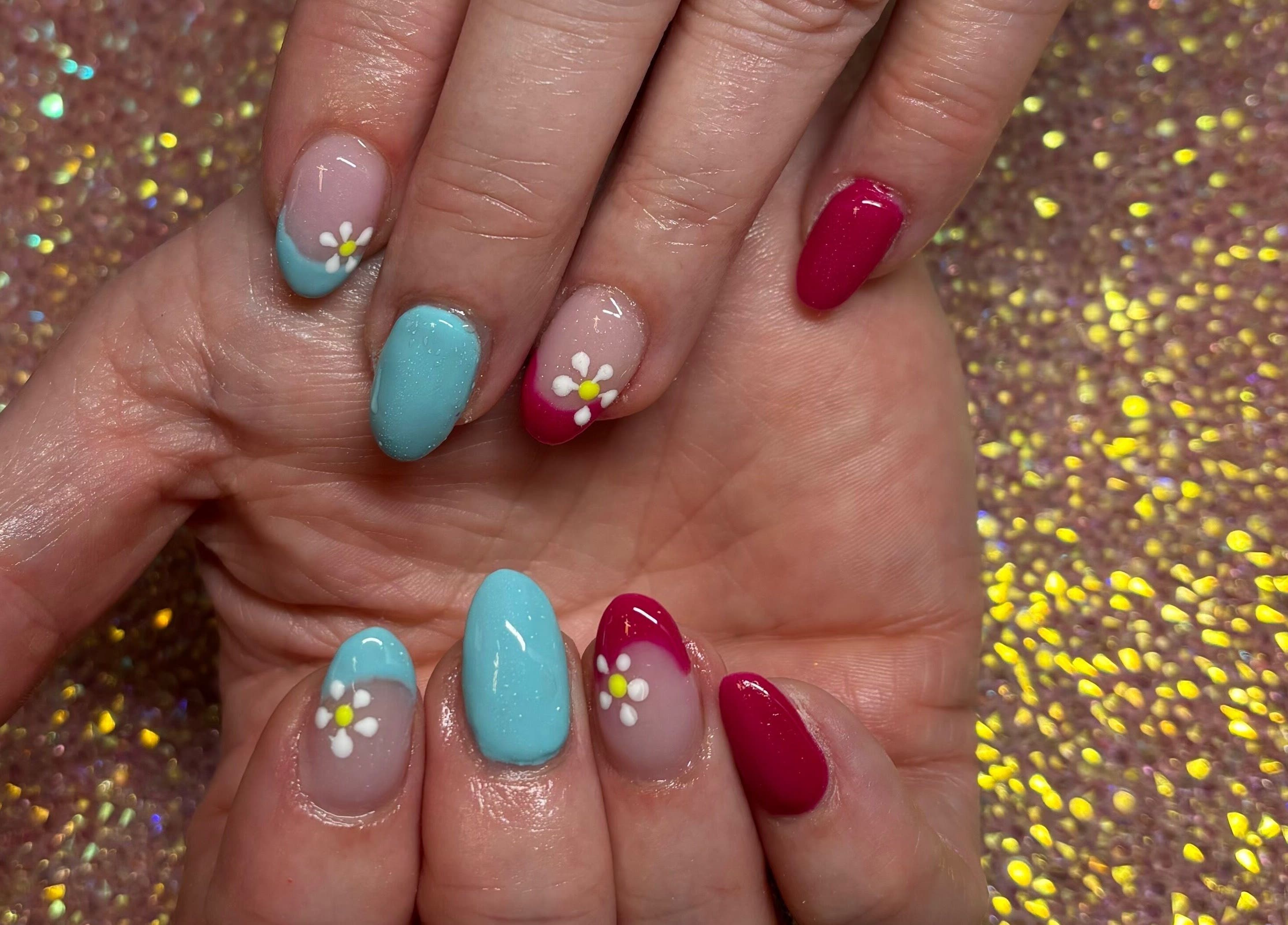 Beautiful floral nail art at Twinkle Toes and Fingers & Aesthetics, Taverham, England, GB. Perfectly detailed and colorful.