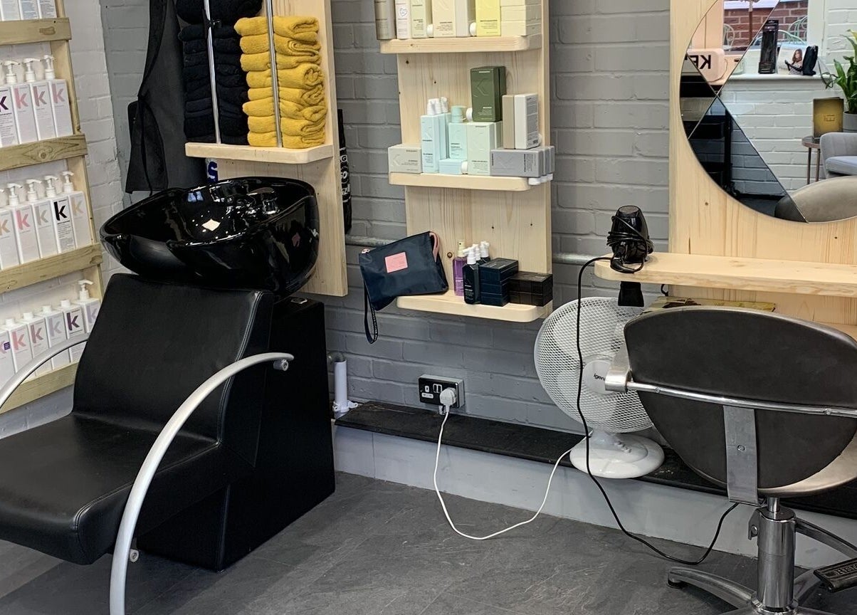 Modern hair styling station at Eistyling, Bedford, England, GB with sleek designs and premium products.