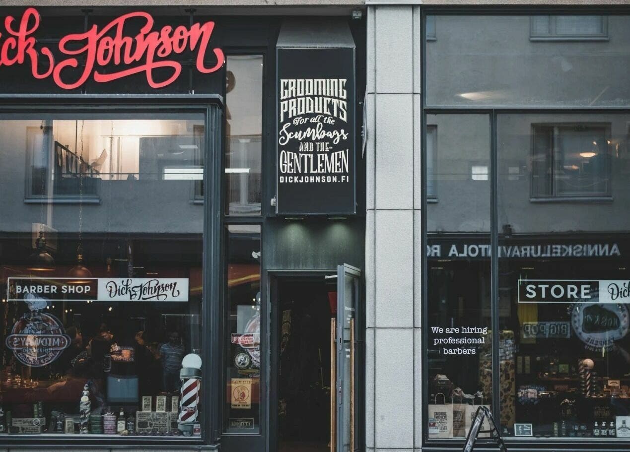 Exterior view of Dick Johnson | Turku, a barber shop in Turku, FI showcasing modern signage.
