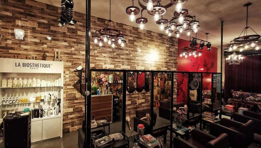 Inch Hair Salon in Kajang, Selangor, MY, featuring stylish interior with modern lighting and decor.