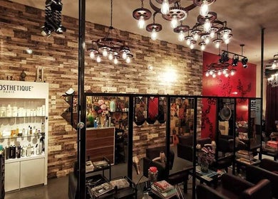 Inch Hair Salon in Kajang, Selangor, MY, featuring stylish interior with modern lighting and decor.