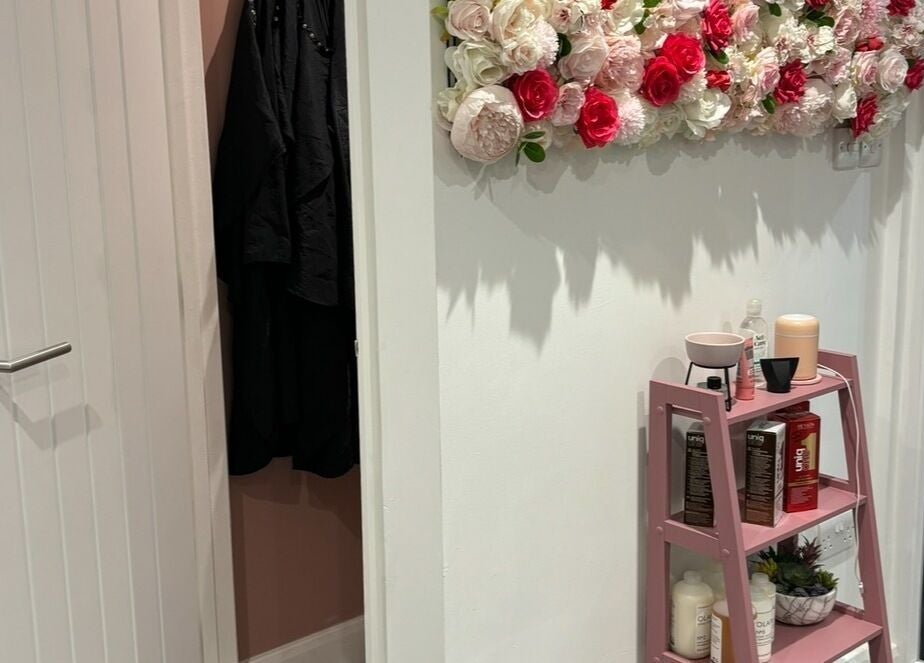 Floral decor and shelf at Lenice Kennedy Hair, Burton Latimer, England, GB.