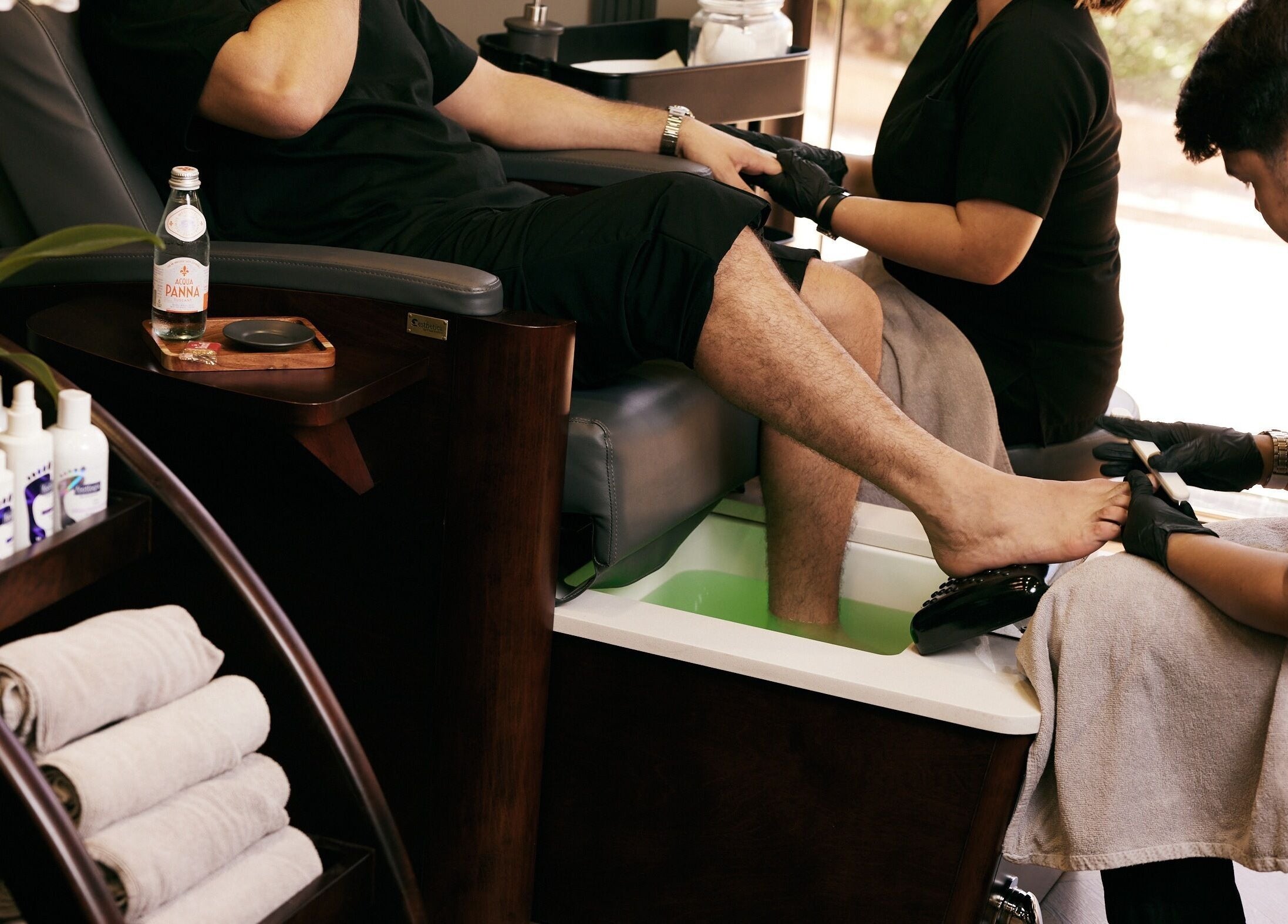 Customer enjoying a pedicure at CG Barbershop, Dubai, AE with professional care and relaxing ambiance.