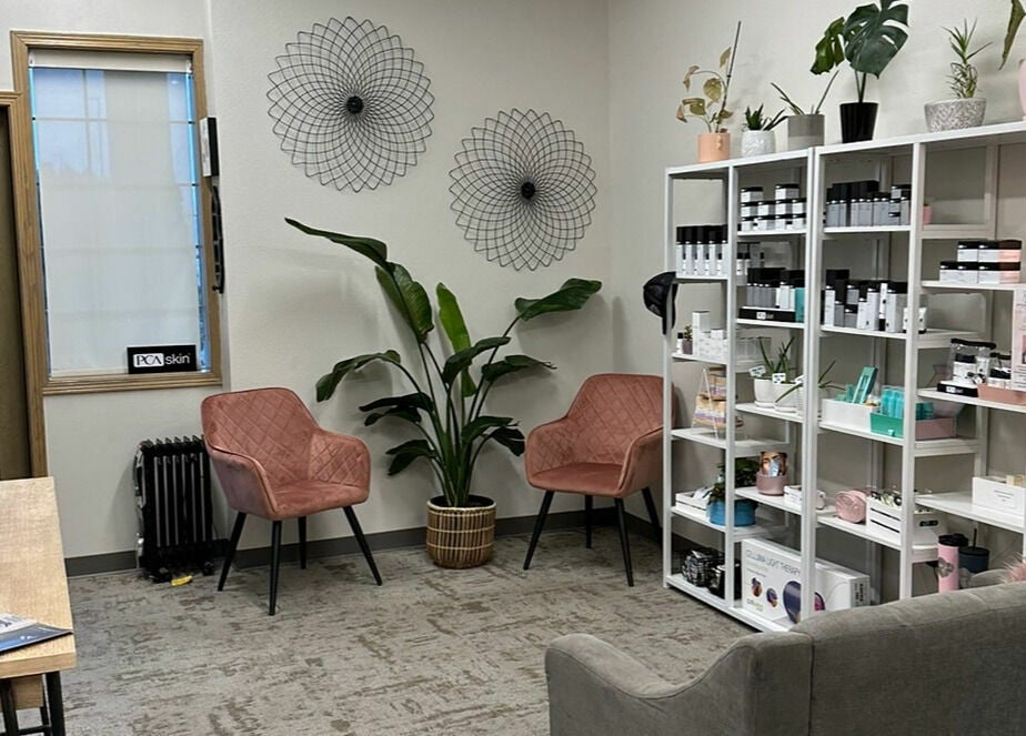 Trystine Studio's cozy seating area in Mount Vernon, Washington, US with plants and product displays.