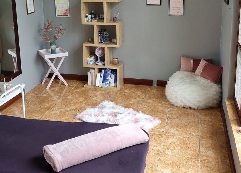 Relaxing room at The Brow Room, Port Elizabeth, Eastern Cape, ZA featuring cozy seating and neutral decor.