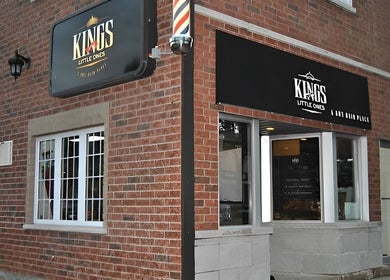 Kings and Little Ones Barber Shop exterior in Cornwall, Ontario, CA, showcasing its stylish facade.