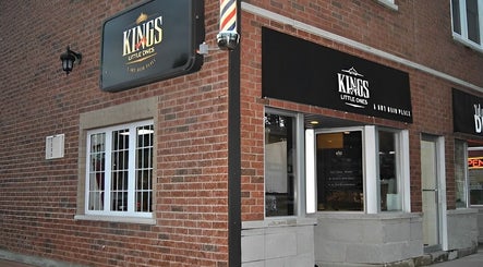 Kings and Little Ones Barber Shop exterior in Cornwall, Ontario, CA, showcasing its stylish facade.