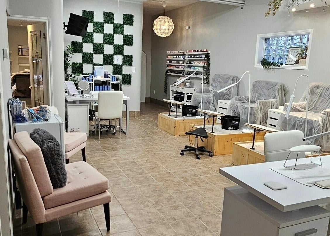 Inviting interior of Hometown Laser Clinic and Spa in Tecumseh, Ontario, CA featuring elegant nail stations.