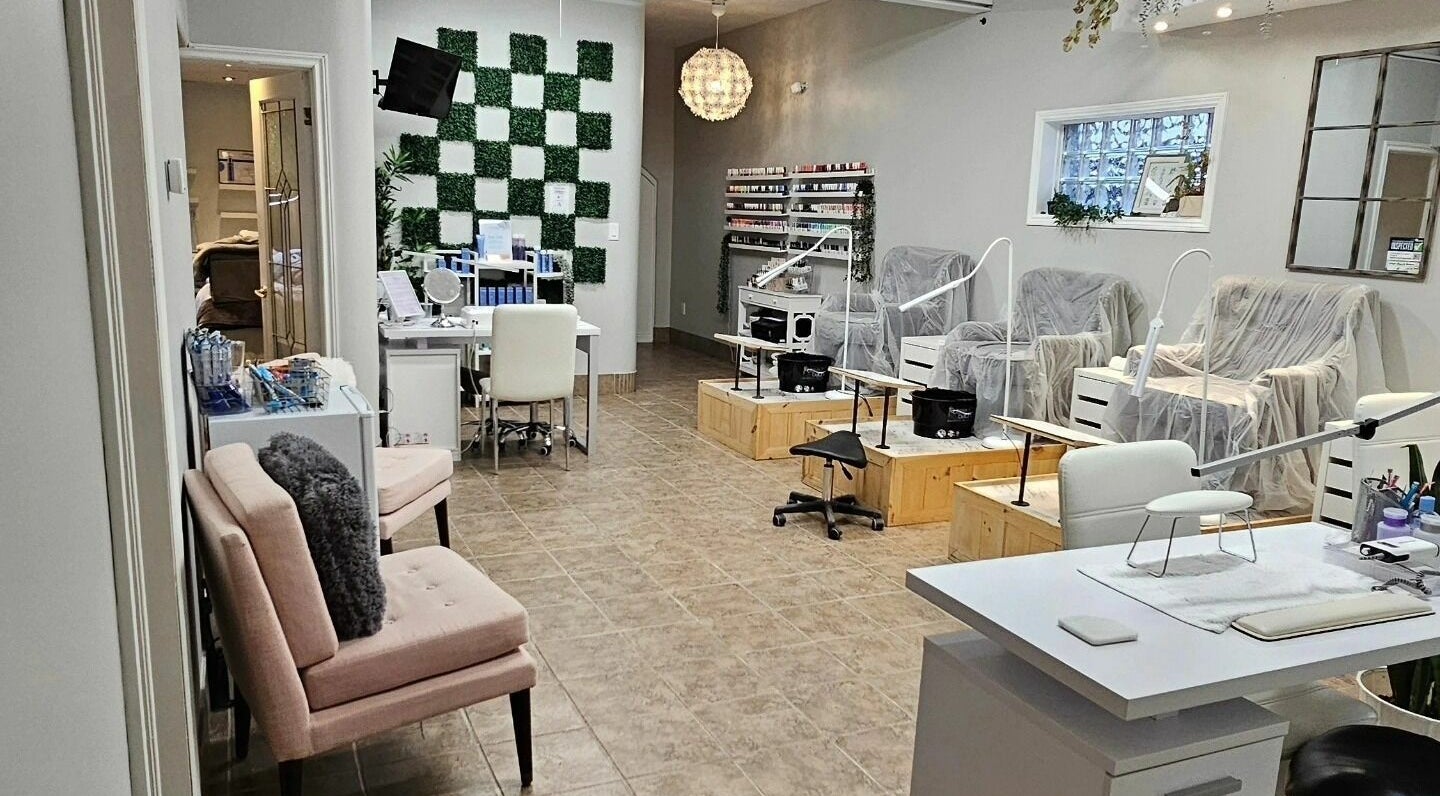 Inviting interior of Hometown Laser Clinic and Spa in Tecumseh, Ontario, CA featuring elegant nail stations.