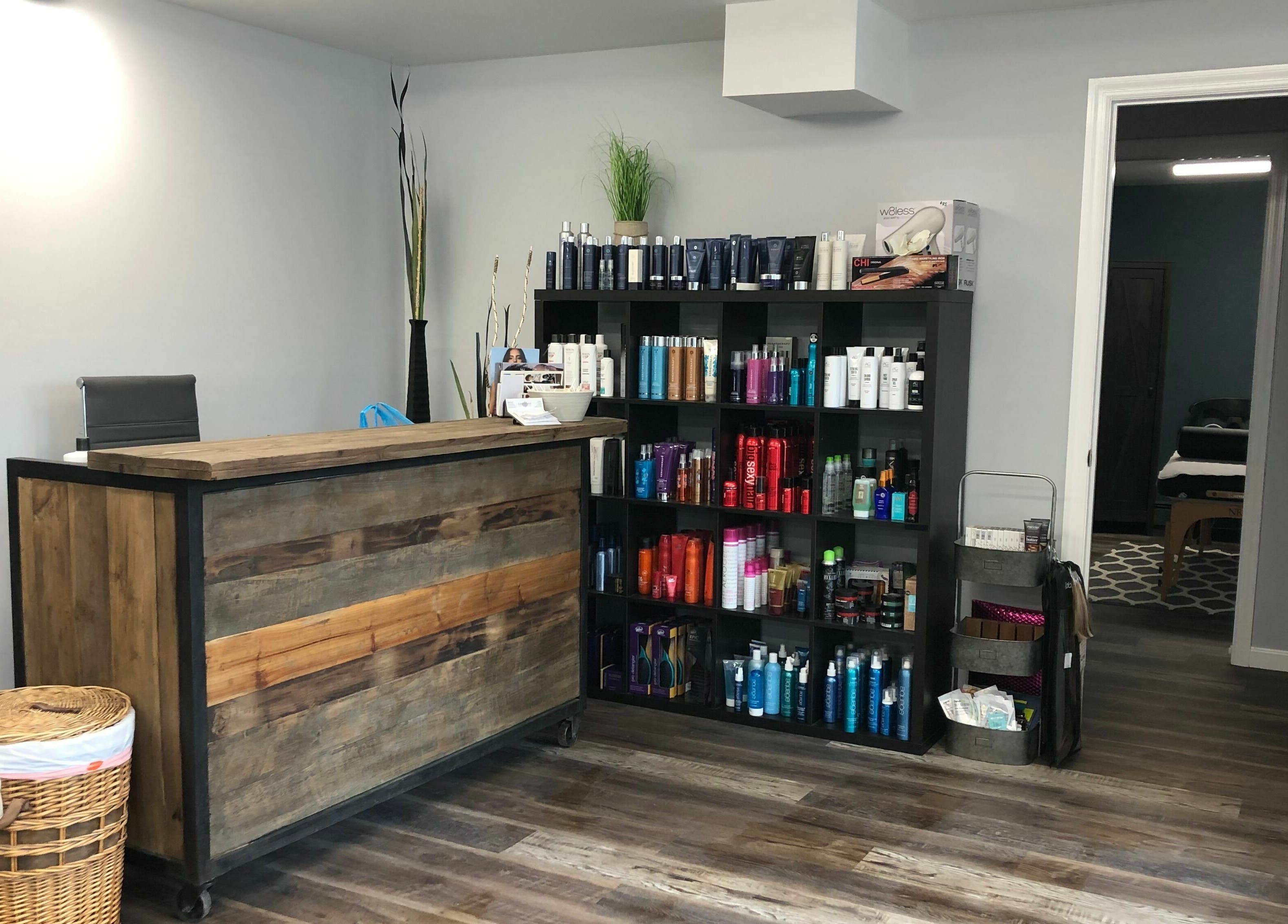 Reception area of Shear Integrity in McMurray, Pennsylvania, showcasing shelves with products.
