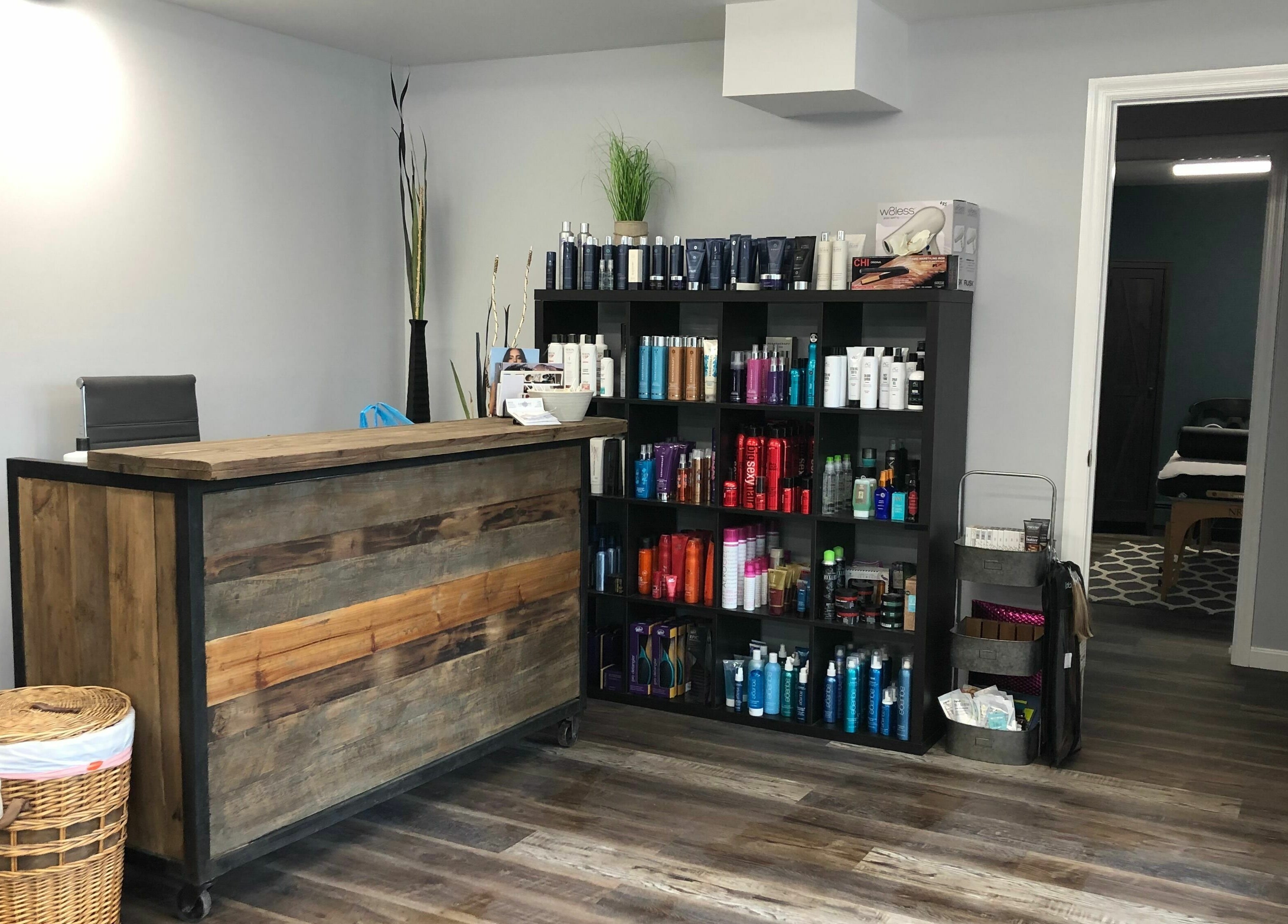 Reception area of Shear Integrity in McMurray, Pennsylvania, showcasing shelves with products.