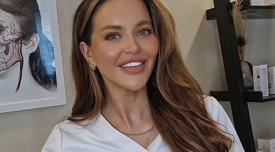 Smiling woman at Hove, Profile + Aesthetics in Hove, England, GB, showcasing beauty and wellness.