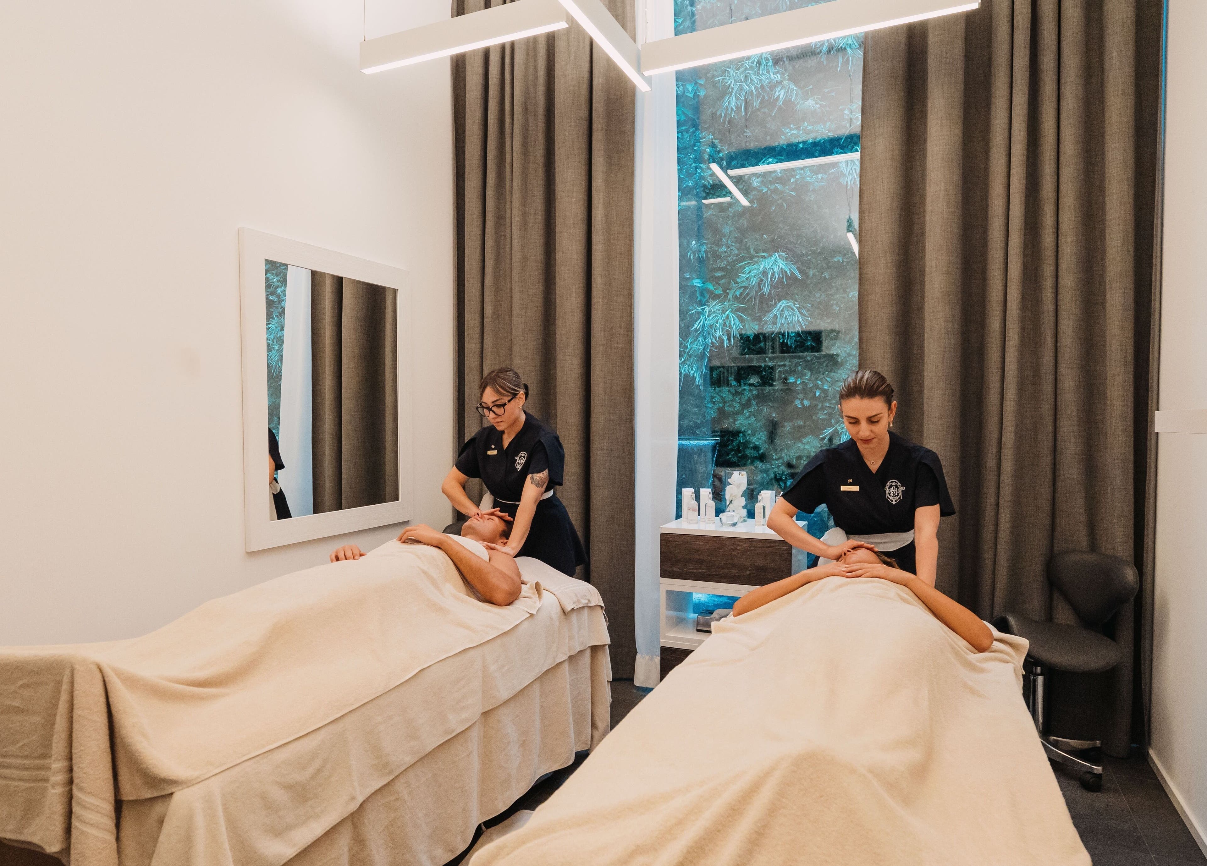 Tranquil massage room at Hotel Splendide Royal, Lugano, Ticino, CH, offering relaxing wellness treatments.