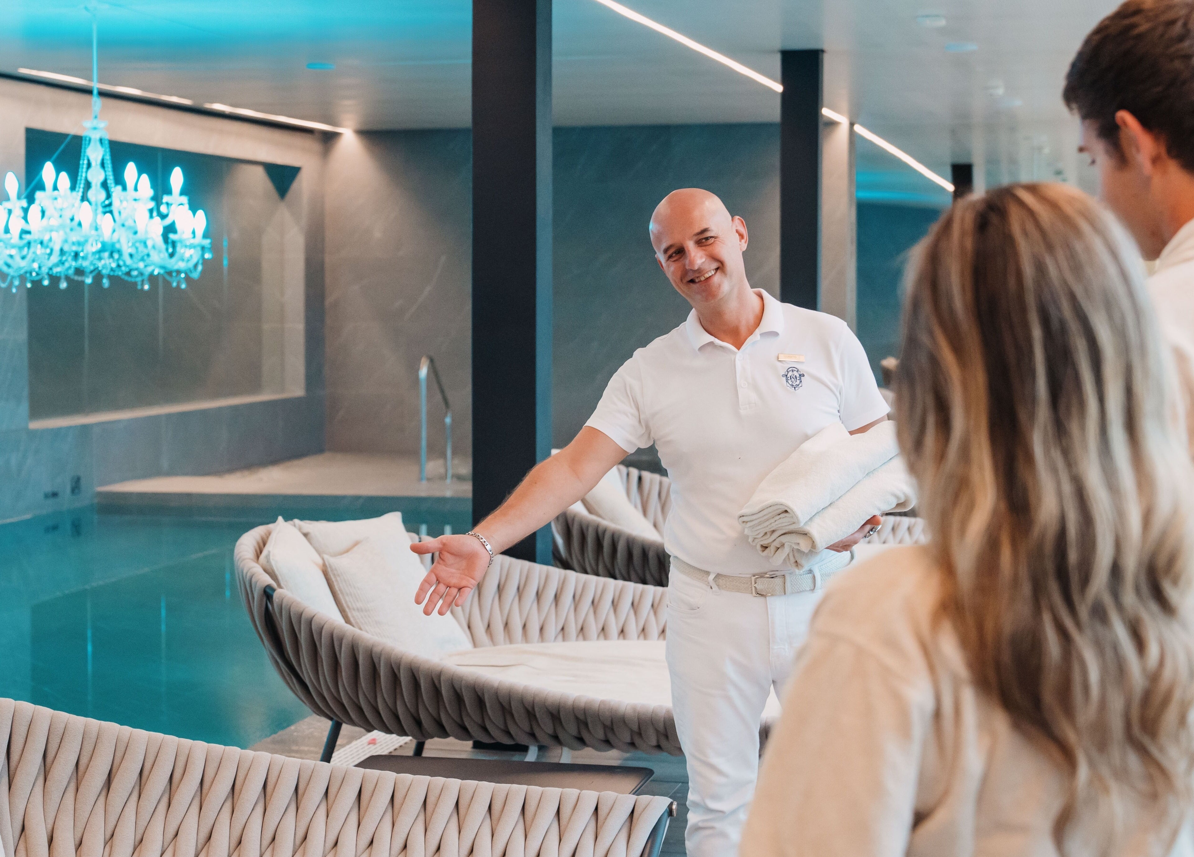 Luxurious spa area at Hotel Splendide Royal, Lugano, Ticino, CH, with staff welcoming guests.