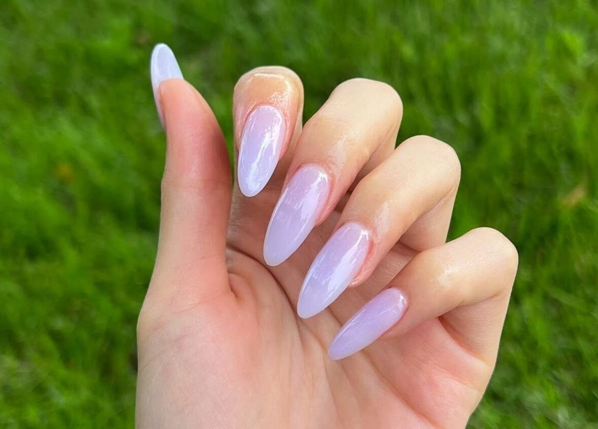 Lavender nails displayed at Dolly Lash Lounge, Pointe-Claire, Québec, CA highlighting manicure finesse.