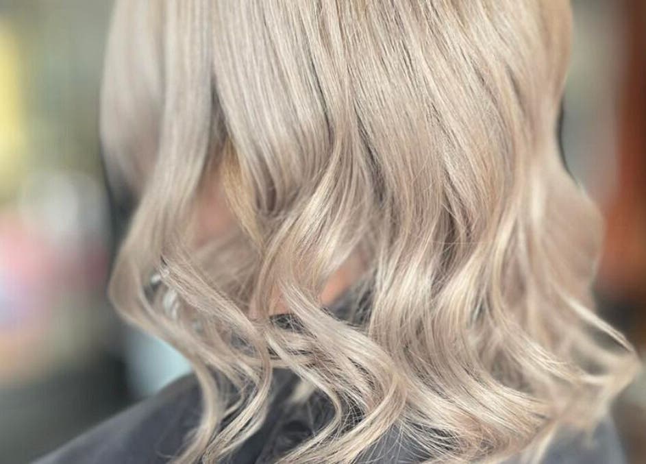 Elegant blonde waves hairstyle at Hair By Megan, Latham, Australian Capital Territory, AU.
