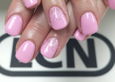 Glamorous pink and glitter manicure at Nailporium & More, Sandton, Gauteng, ZA.