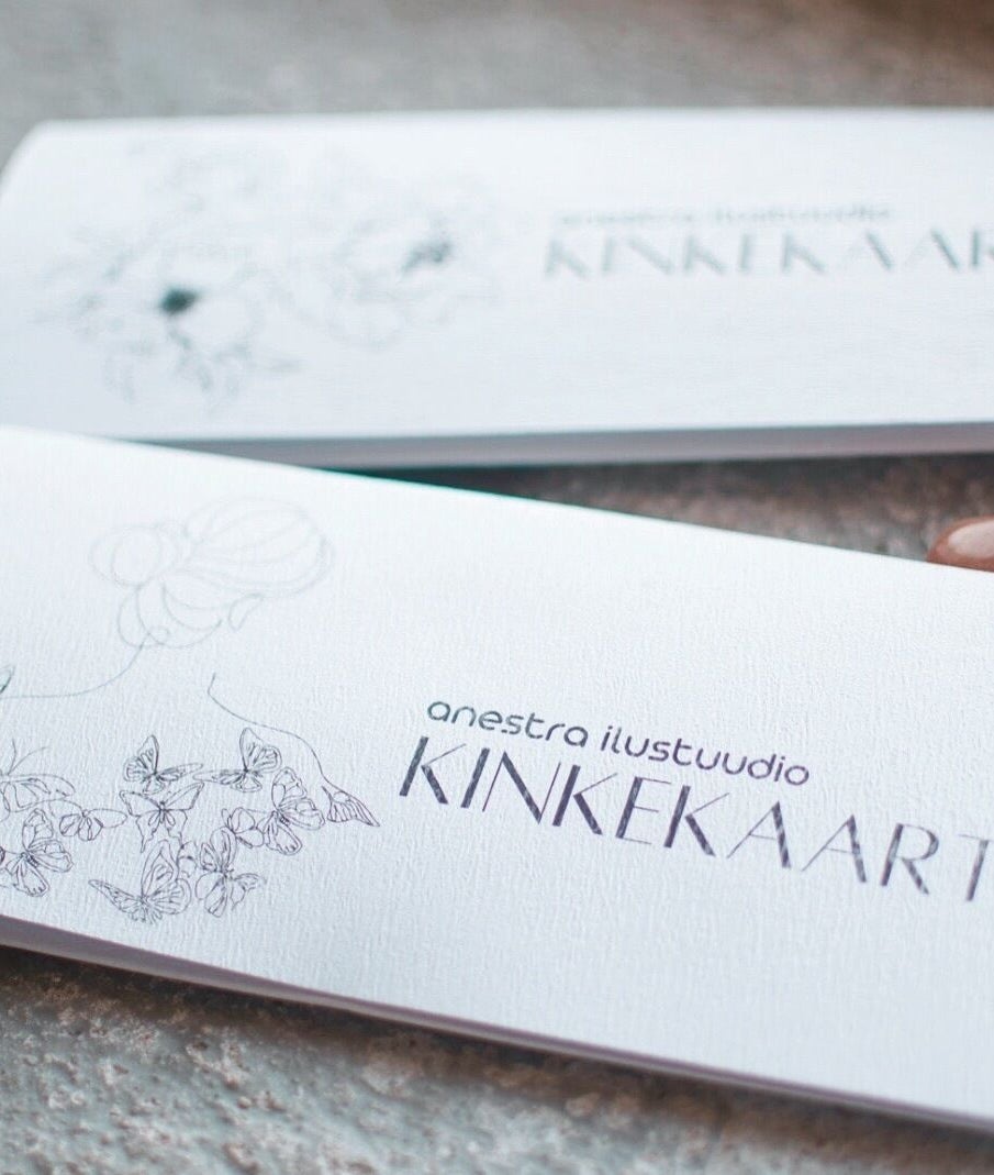 Elegant gift card for Anestra Ilustuudio, Tallinn, Harju maakond, EE, surrounded by decorative stones.