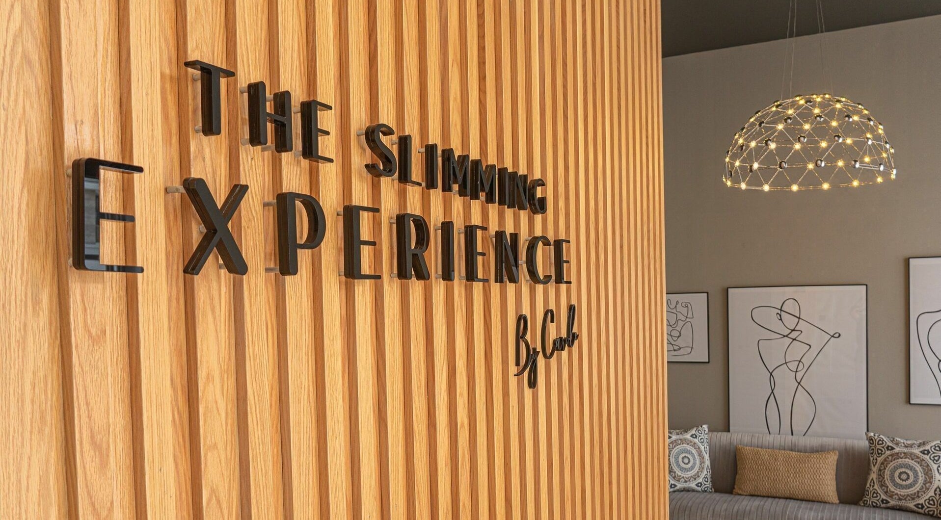 Modern interior at The Slimming Experience, Dubai, AE, showcasing artistic decor and luxurious ambiance.