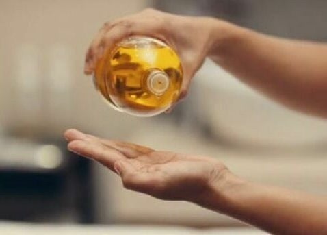 Massage oil being poured at The Slimming Experience, Dubai, Dubai, AE.