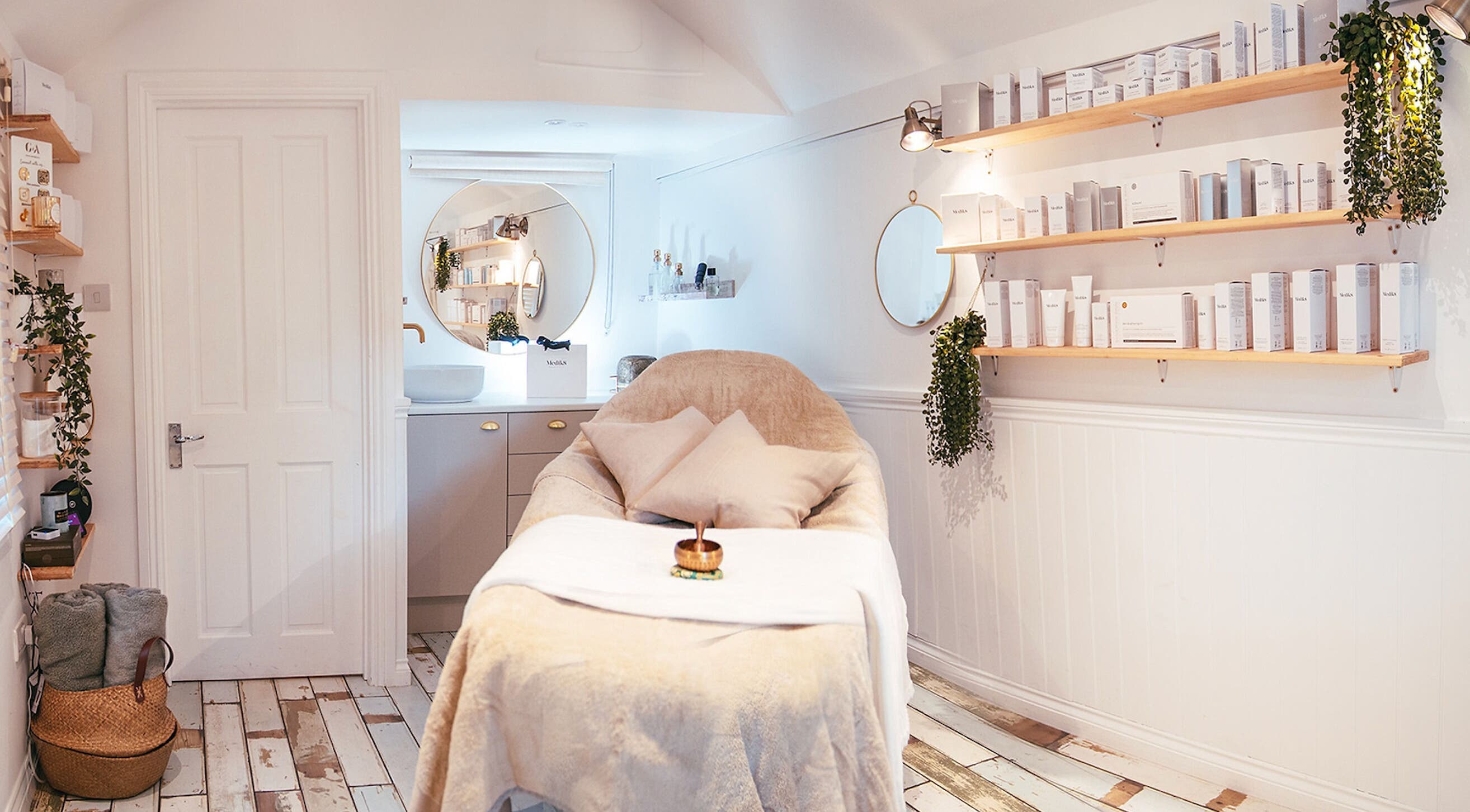 Relaxing treatment room at Gaia Skin, Laser and Aesthetics Clinic, England, England, GB with soothing decor.