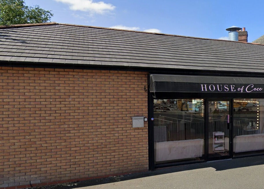 Exterior view of House of Coco in Northwich, England, GB showcasing welcoming brick design and modern entrance.