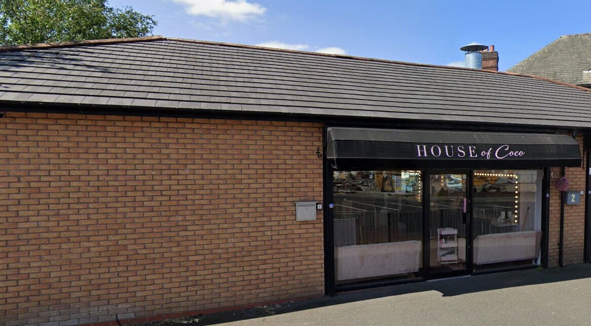 Exterior view of House of Coco in Northwich, England, GB showcasing welcoming brick design and modern entrance.