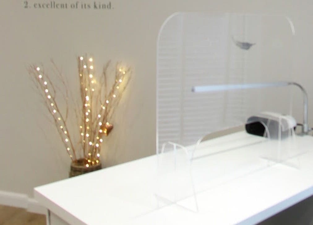 Sophisticated nail station at Bella Salon, Nairn, Scotland, GB, adorned with decorative glowing branches.