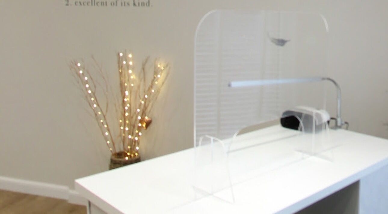 Sophisticated nail station at Bella Salon, Nairn, Scotland, GB, adorned with decorative glowing branches.