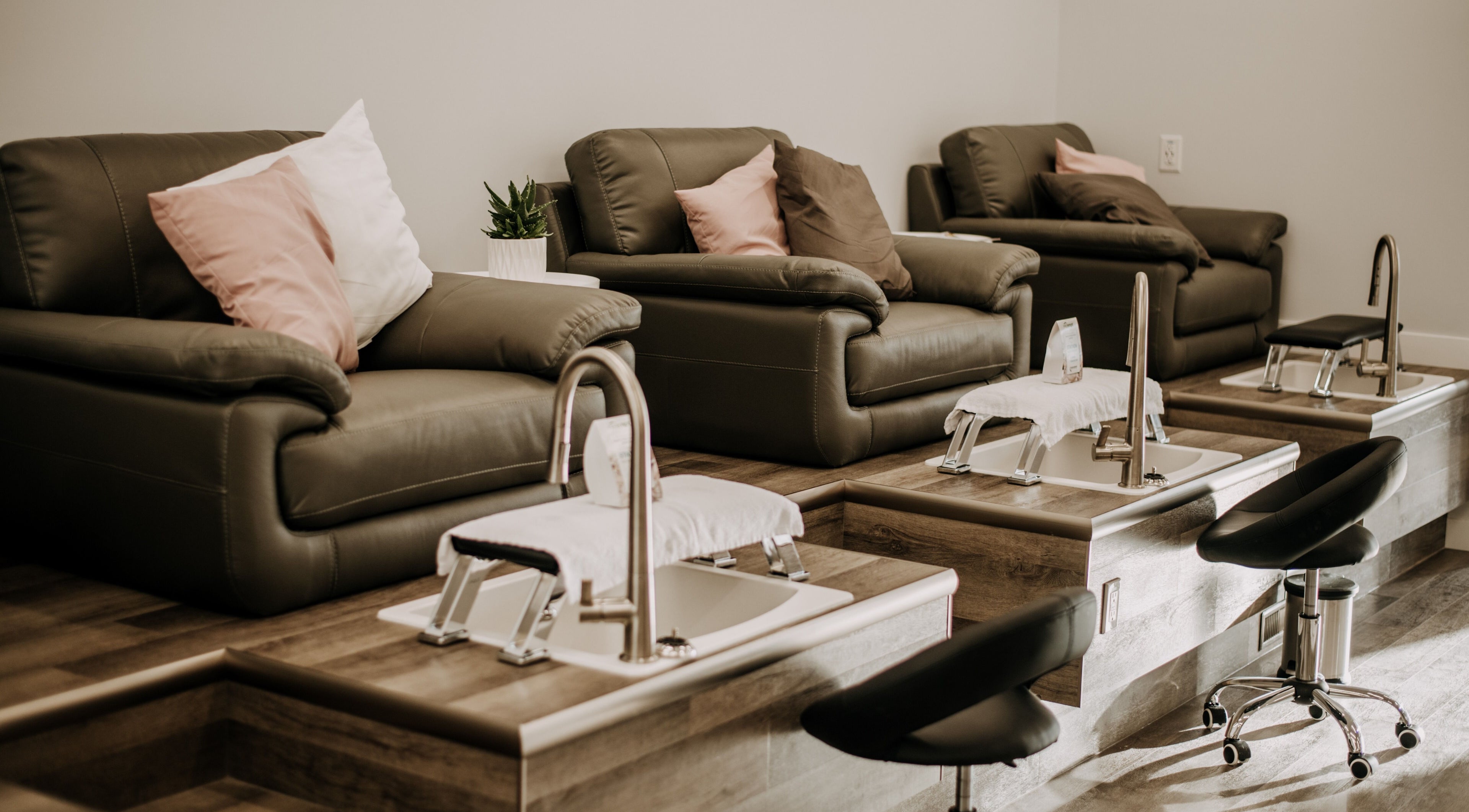 Comfortable leather chairs in pedicure area at 306 Day Spa, Watrous, Saskatchewan, CA offering relaxation.