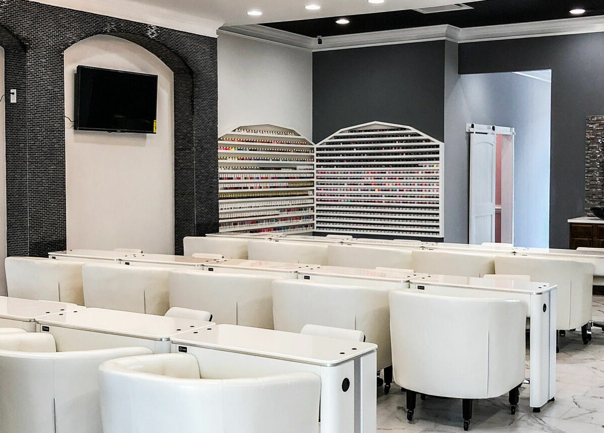 Inside Gloss Nail Bar showcasing modern nail stations in Clover, South Carolina, US.