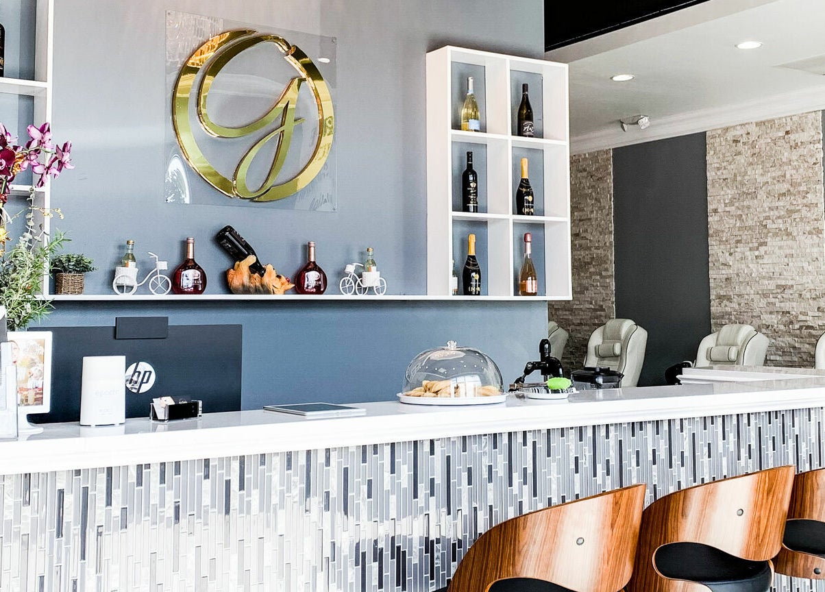 Modern interior of Gloss Nail Bar in Clover, South Carolina, featuring a stylish reception area.