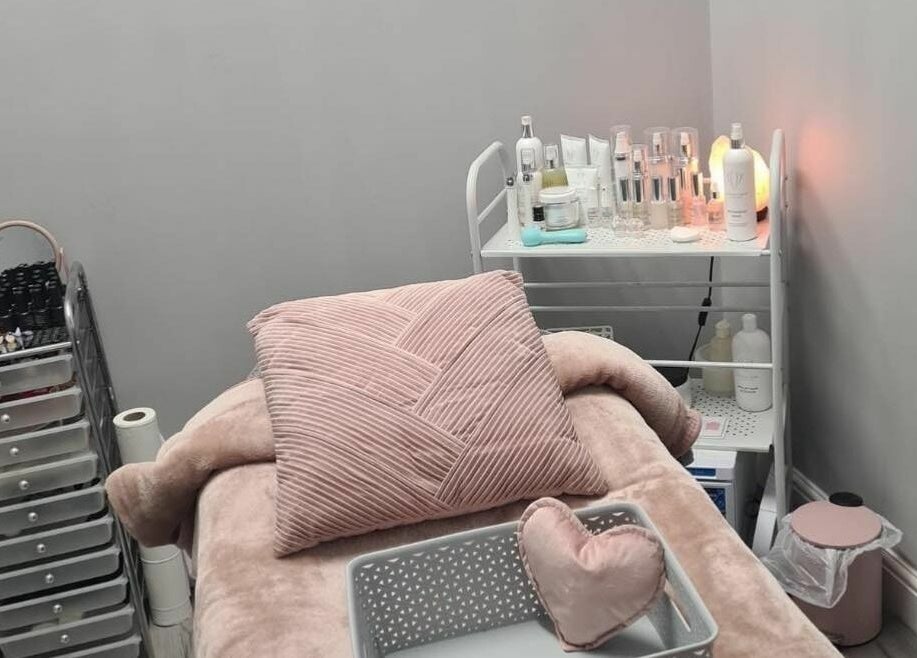 Relaxing treatment room at Ashley Allan Hair Replacement Studio, Sauchie, Scotland, GB, with plush decor.