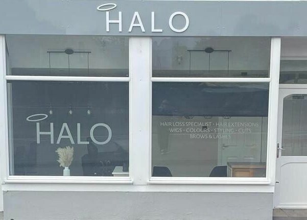 Front view of Ashley Allan Hair Replacement Studio in Sauchie, Scotland, GB showcasing sleek signage.