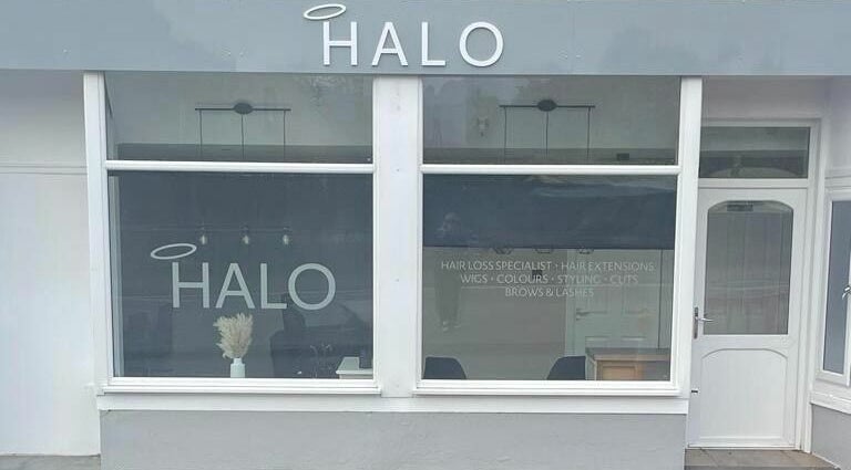 Front view of Ashley Allan Hair Replacement Studio in Sauchie, Scotland, GB showcasing sleek signage.