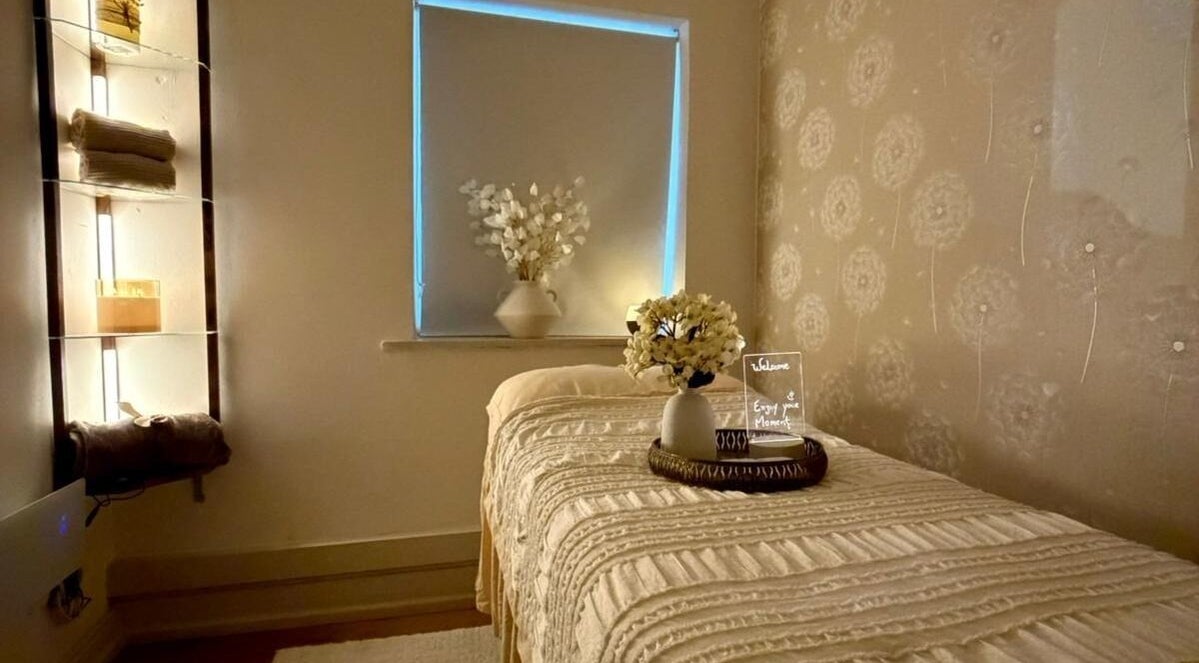 Calm treatment room at Eden Clinic Aesthetic & Laser, Dublin, County Dublin, IE with cozy linens and decor.