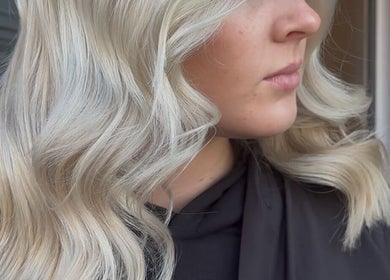 Blonde wavy hairstyle at Claire Sinclair Hair, Tillicoultry, Scotland, GB salon.