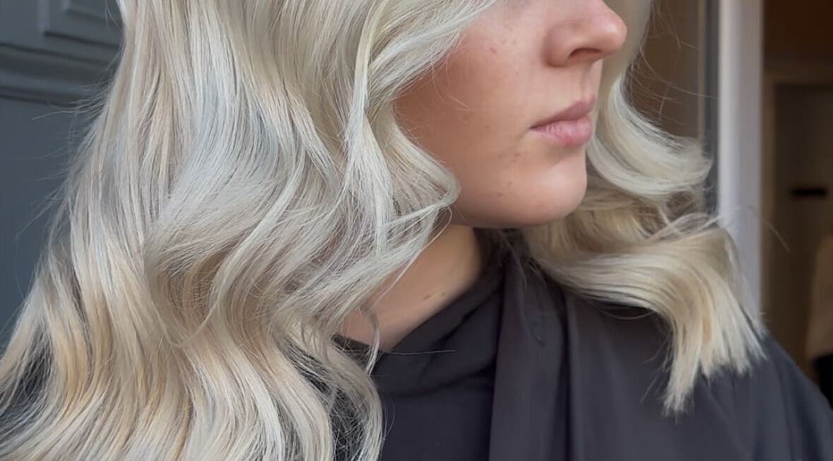 Blonde wavy hairstyle at Claire Sinclair Hair, Tillicoultry, Scotland, GB salon.