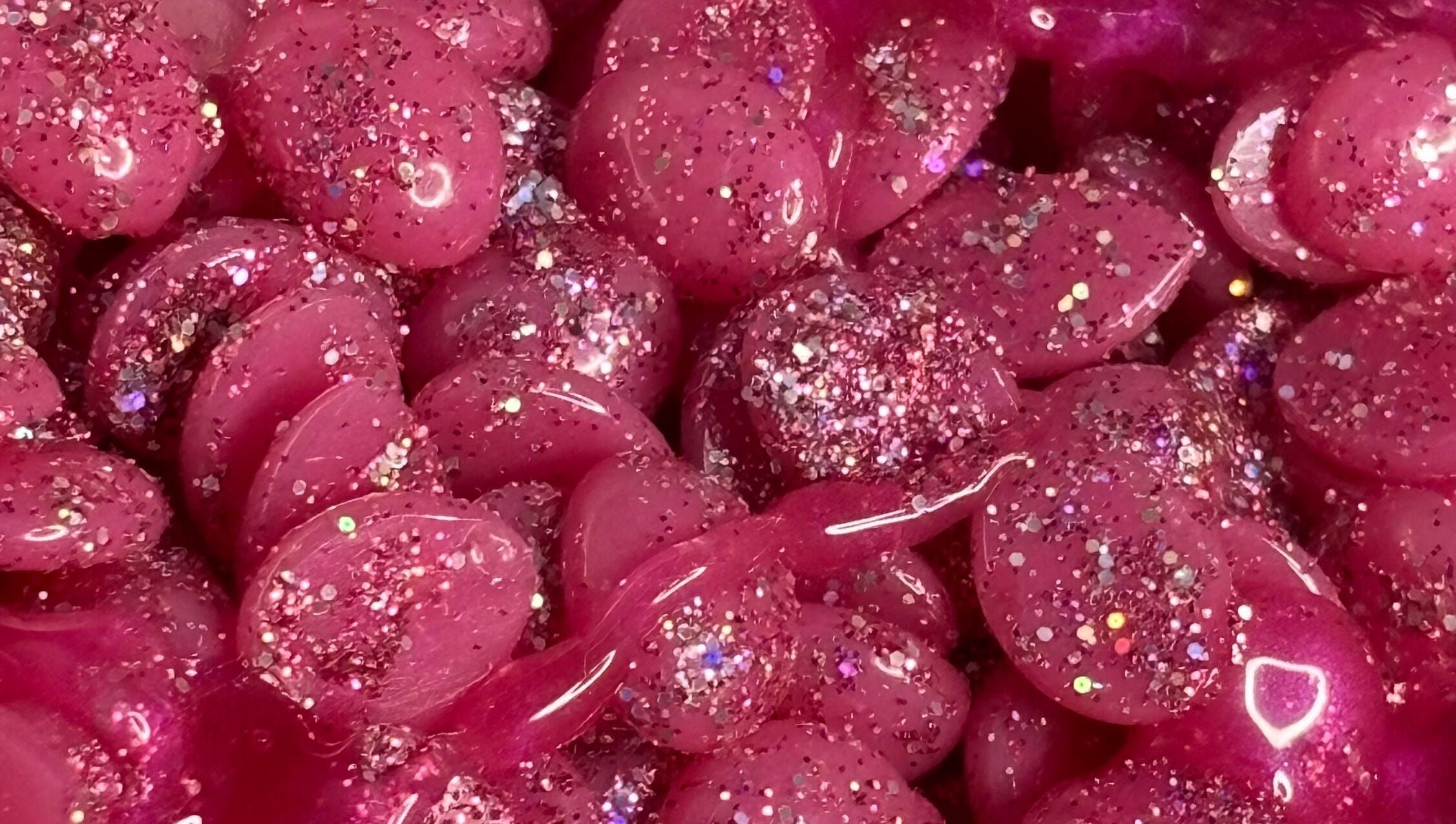 Glittery pink wax beads at My Candy Wax, River Grove, Illinois, US, ideal for waxing treatments.