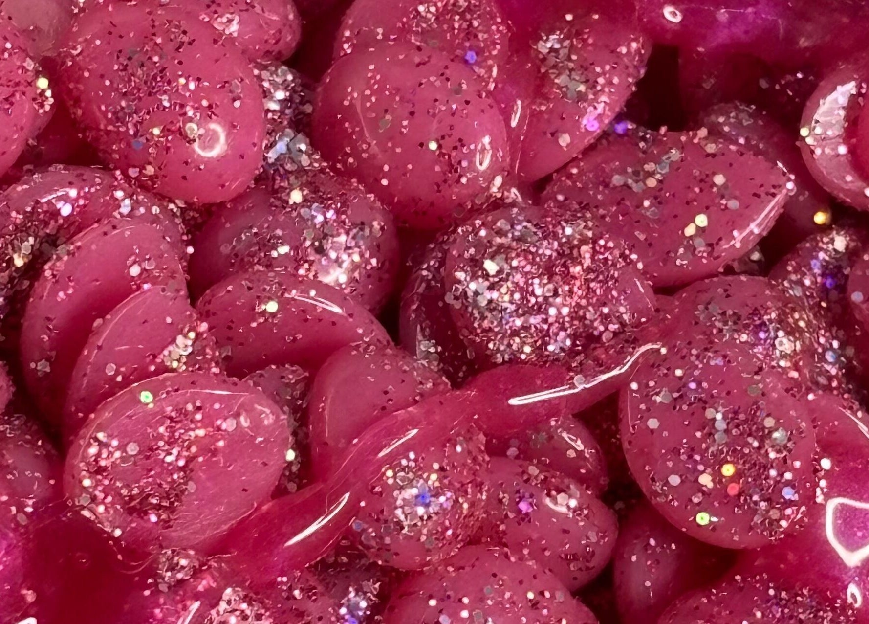 Glittery pink wax beads at My Candy Wax, River Grove, Illinois, US, ideal for waxing treatments.