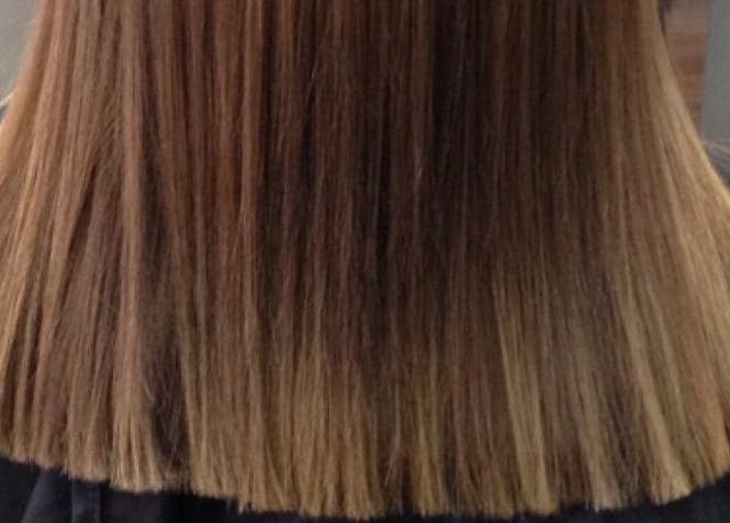 Beautiful sleek hairstyle by Mynx Hair Design, Healesville, Victoria, AU. Showcasing smooth, straight brown hair.