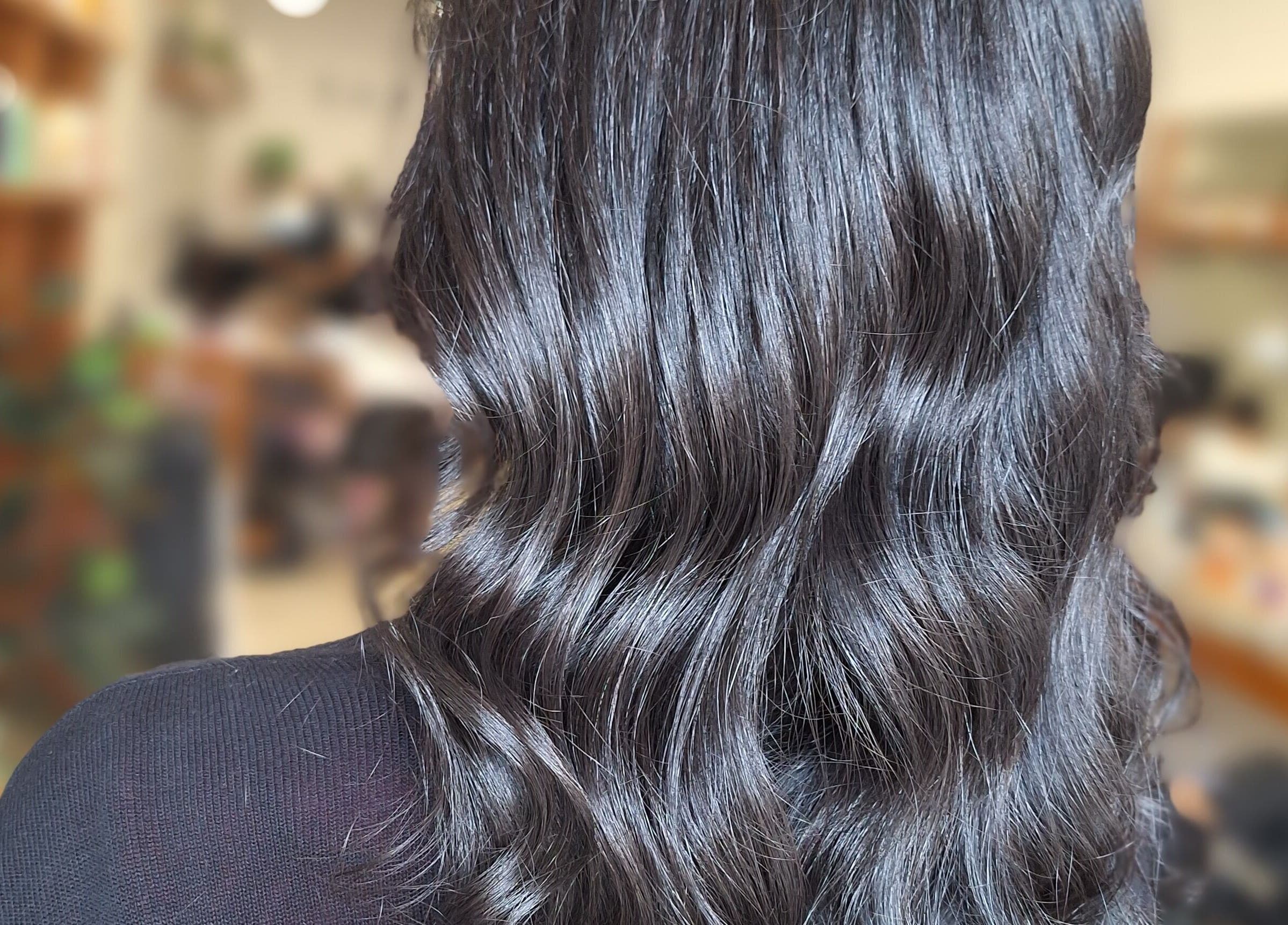 Silky black hair styled at Xar Hair & Nails, Is-Swieqi, MT.