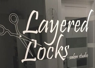 Layered Locks LLC logo at The Beauty District Salon Suites in Phoenix, Arizona, US.